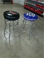 Two stools one with advertising for grasshopper