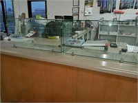 Two countertop locking glass display cases