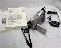 Cannon Camcorder W/ Charger & Books
