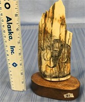6.5" mammoth ivory section scrimshawed with a char