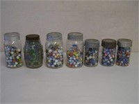LOT OF 7 JARS OF MARBLES - BEAUTY'S & CATS EYES