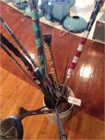 Two flags, two oars, golf club, bow, and more