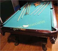 Olhausen billiards table with leather pockets,