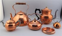 5 Copper Tea Pots.