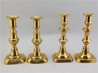 Group of 4 Antique Brass Push Up Candlesticks