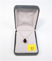 14 K gold necklace with garnet tear drop pendant
