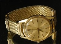 Vintage Swiss 14kt Gold "Universal" Watch