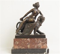 Antique French bronze nude on lion statue