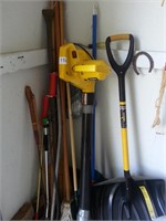 Group of long handle tools snow shovel pry bars