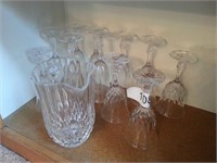 Press glass pitcher and drinking glass