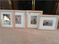Four signed prints by the same artist
