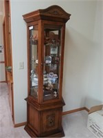 6 foot tall three sided curio with glass door and