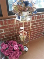 Two tier plant stand and three artificial plants