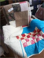 Two large patterned quilts