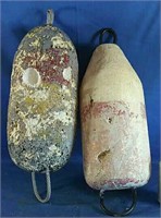 Vintage pair of lobster buoys with hooks from PEI