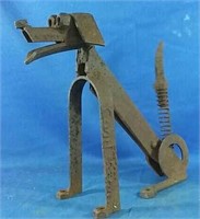 Metal Folk Art Dog with wagging spring tail named
