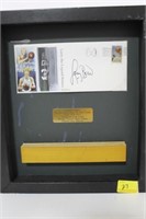 FRAMED PIECE OF BASKETBALL FLOOR - AUTOGRAPHED BY