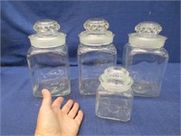 4 older glass apothecary jars (frosted rims)