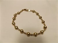 Ladies 14 kt gold heart design bracelet