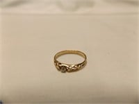 Ladies 14kt Yellow gold diamond pinky ring.