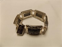 Silvertone bracelet with gray glass stones
