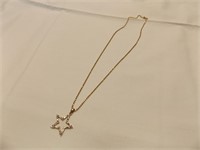 14kt yellow gold necklace w/ diamond star pendant