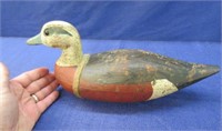 antique wooden duck decoy by white