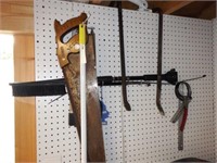 (2) Stanley hand saws, (2) pry bars and oil