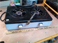 Portable propane stove with 2 burners.