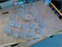 Glass punch bowl with 24 cups. Great condition.
