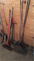 4 rakes and several miscellaneous yard tools