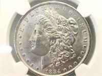 1884-O NGC BRILLANT UNC. MORGAN SILVER DOLLAR