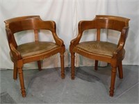 Pair of Oak Armchairs.Carved Arms