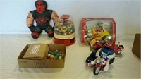 M&M toys, trinket machine and wrestling doll