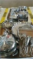 Many pieces of silver plate