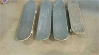 4 skateboards