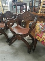 Pair of antique carved wood savonarola armchairs