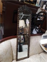 Narrow antique wall mirror