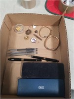 Box with jewelry, cross pens etc