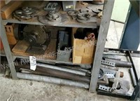 Metal items under bench, next to furnace, & under