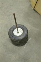 LAWN MOWER TIRES ON RIMS WITH MAKESHIFT AXLE