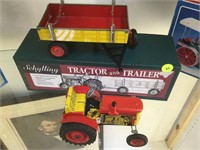 Schilling Tin toy tractor and trailer, mib