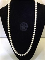 32 in. Strand of 83 cultured pearls, w/ copy of