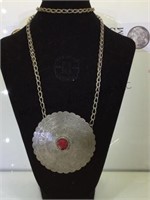 Large coin silver medallion on chain w/ red