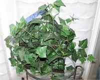 Decorative bird cage with artificial plant