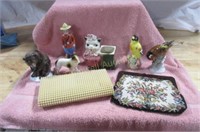 Figurine grouping and purses