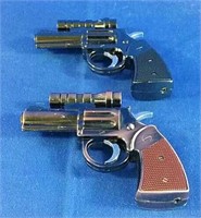 2 replica gun laser pointers / lighters