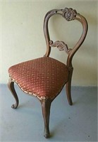Victorian accent chair with slight apology