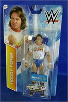 Rare Rowdy Piper Autographed Action Figure