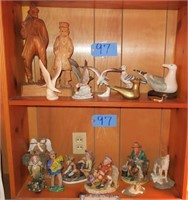 Lot, figurines and two fisherman carvings,